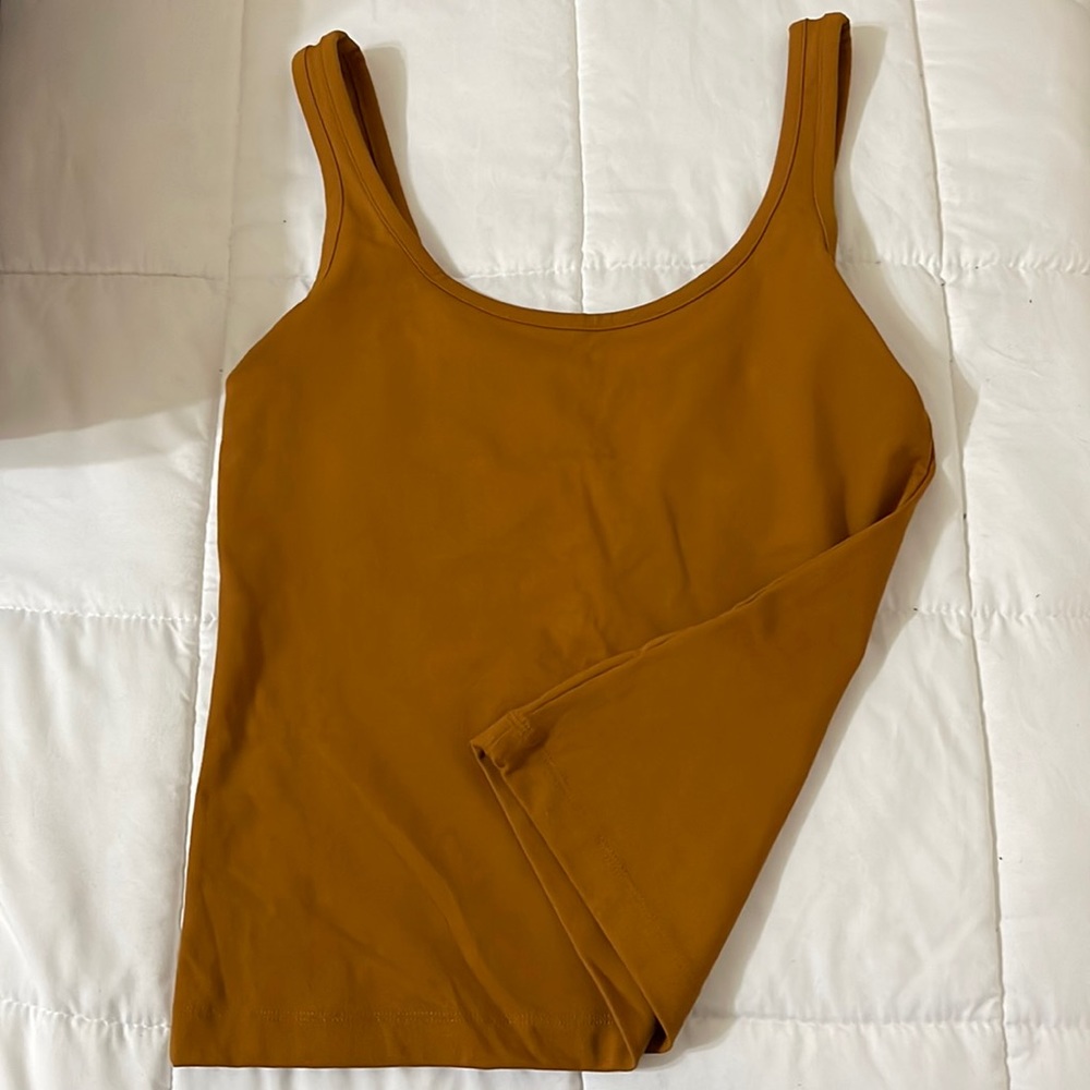 Club Monaco top , Size small, Mustard colour